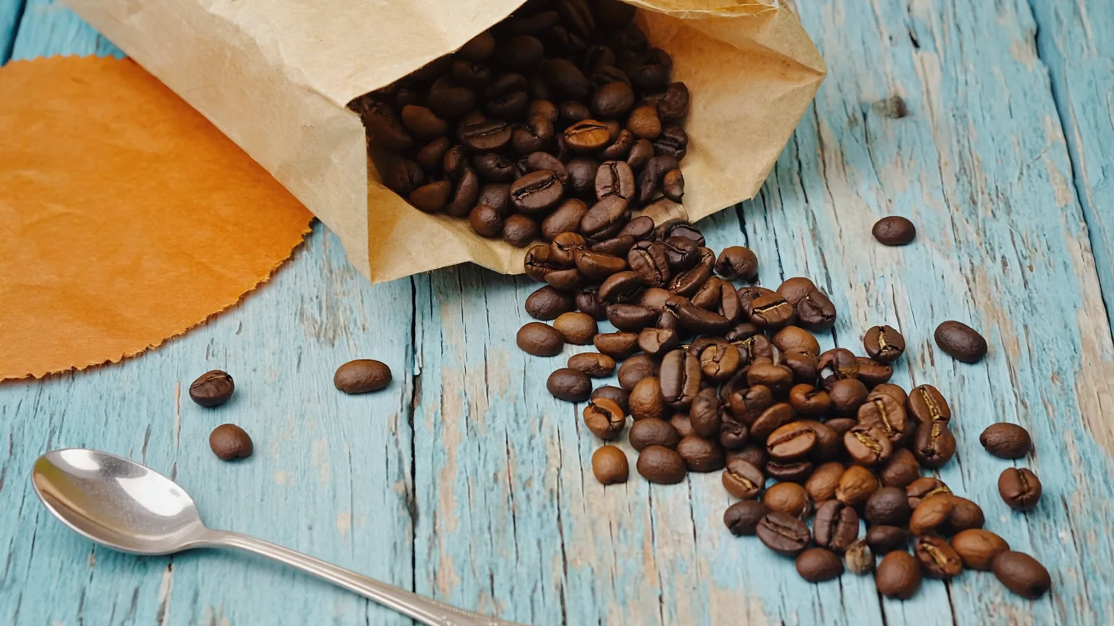 Editorial close-up of coffee beans in soft morning light